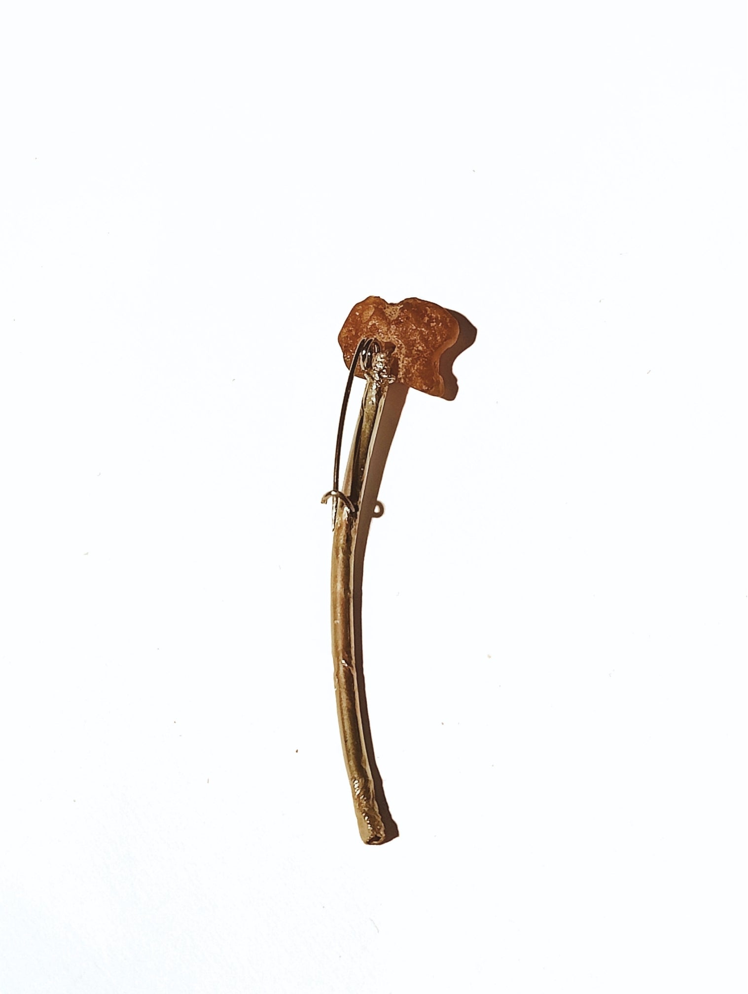 Fool's Gold handmade brooch with amber bead, back view