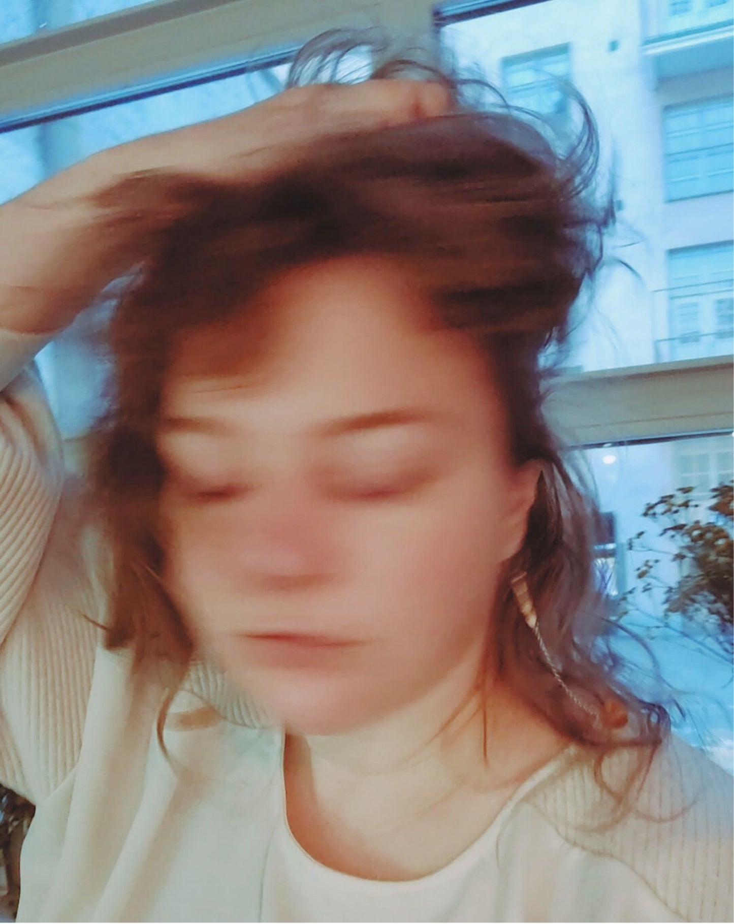 Long Fool's Gold statement earrings with amber, side view worn on ear