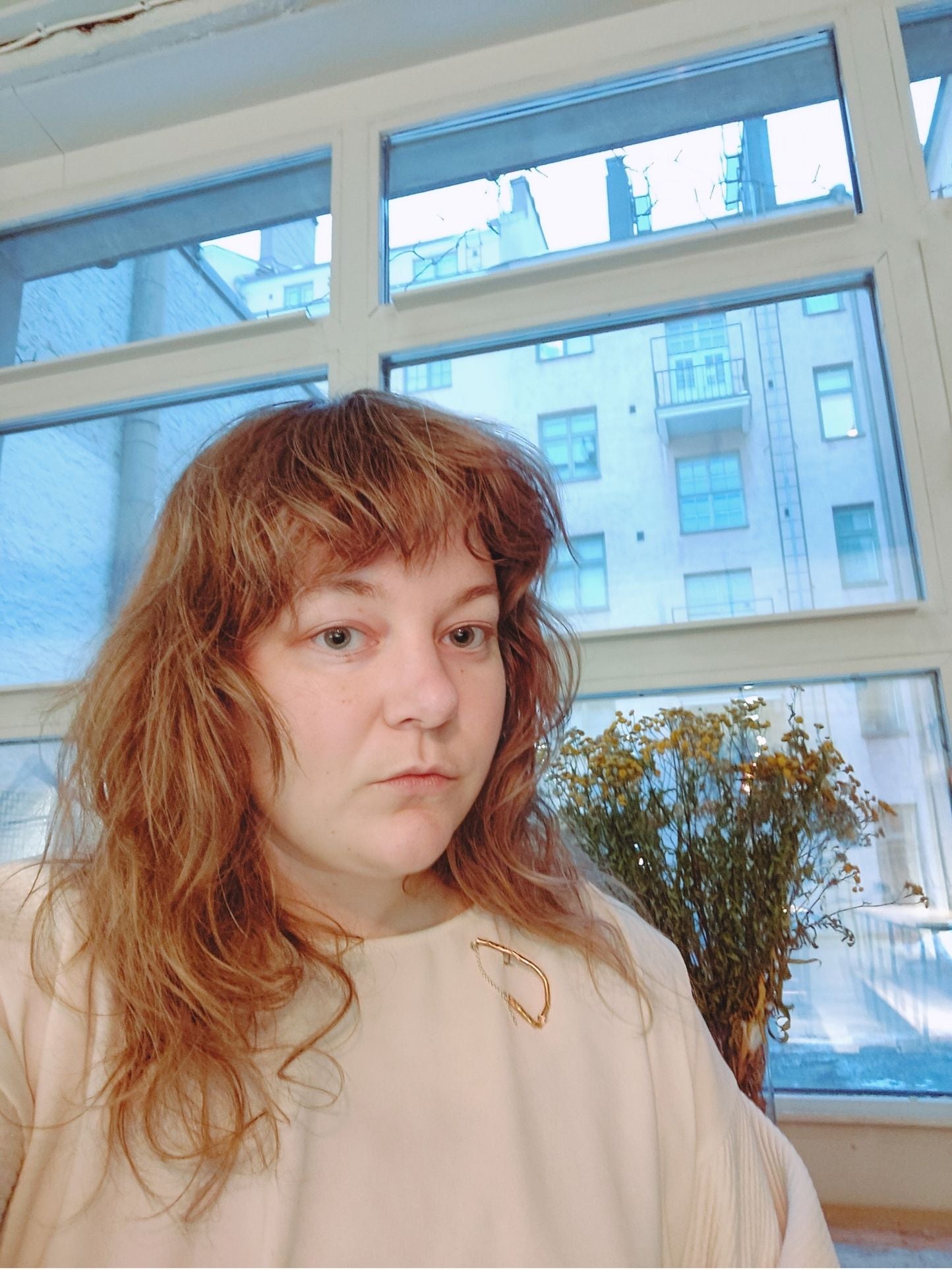 Fool's Gold brooch with golden brass shimmer, shown worn on shirt