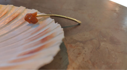 Fool's Gold brooch with brass, amber and silver, close-up detail view