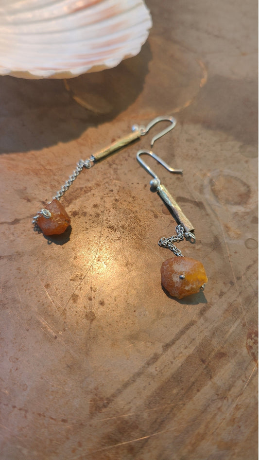 Long Fool's Gold earrings with brass, amber and silver, close-up detail view